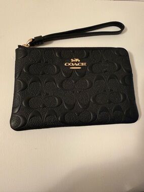 New w/o tags Coach Black Embossed Leather Zip Wristlet with Gold Logo